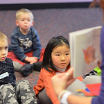 BroomfieldEnterprise > Mason Monroe, 4, left, Jack Smith, 4, and Lindsay Uba, 5  listen to children's librarian Susan Person read a book during the preschool story time at the Mamie Doud Eisenhower Public Library on Thursday.
December 27, 2012
staff photo/ David R. Jennings